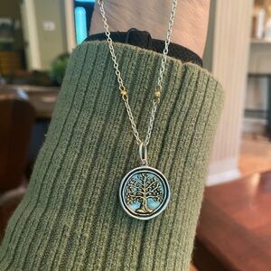Waxing Poetic Tree of Life pendant with silver and brass chain